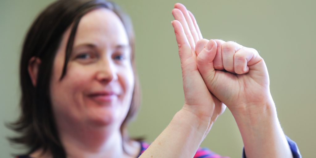 American And Canadian Sign Languages Compared